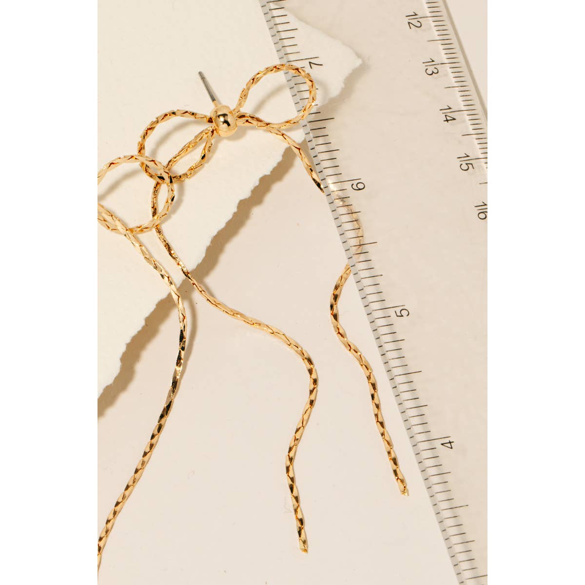 Long Metallic Ribbon Bow Stud Earrings