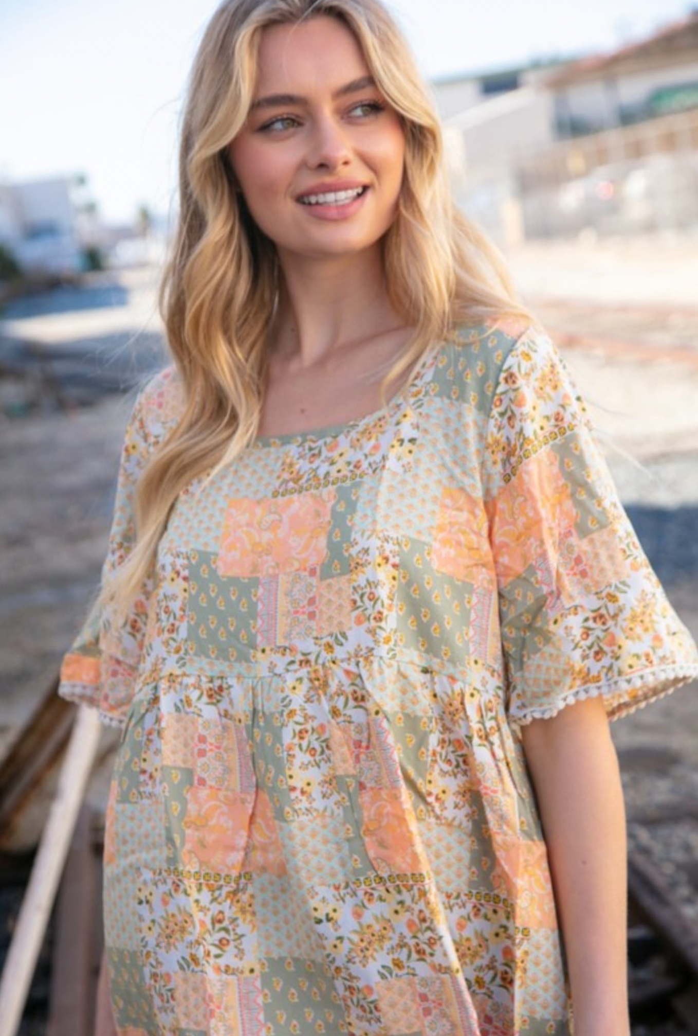 BOHEMIAN FLORAL FLUTTER SHORT SLEEVE WOVEN TOP